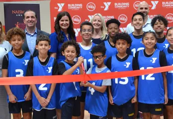 Youth at North Brandon YMCA gymnasium ribbon cutting.