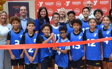 Youth at North Brandon YMCA gymnasium ribbon cutting.